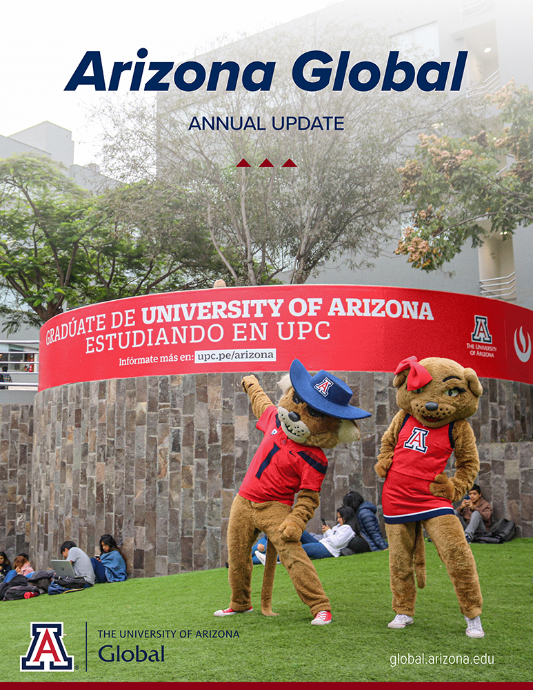 Arizona Global 2021 Annual Update cover with photo of Wilbur and Wilma Wildcat with banner sign at UPC