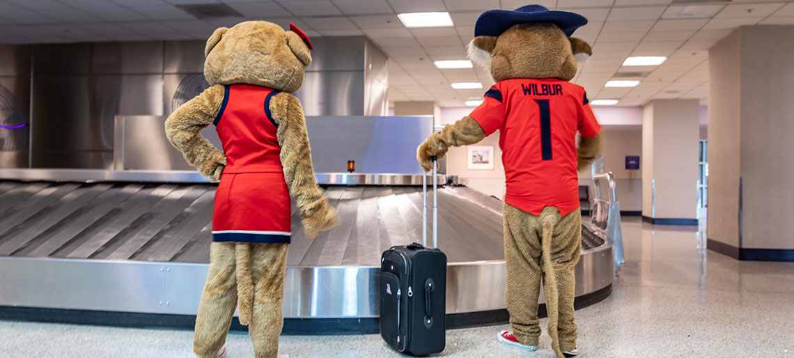 Wilbur and Wilma at baggage claim