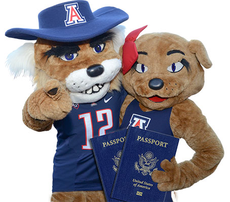Wilbur and Wilma holding passports