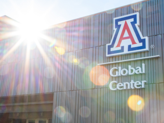 Sun sets behind the University of Arizona Global Center building