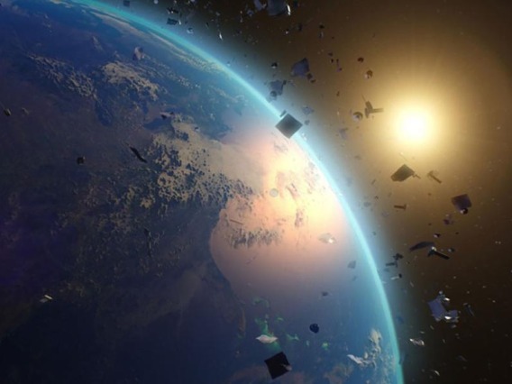 Debris floats in space in the Earth's orbit