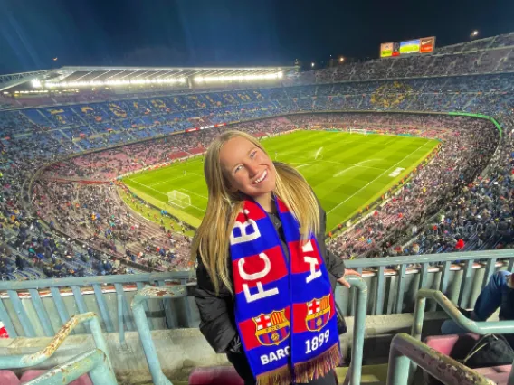 Kylie at the top of a football stadium in Barcelona, Spain