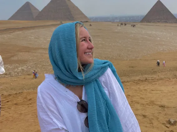 Kylie looks back at the pyramids of Giza, Egypt