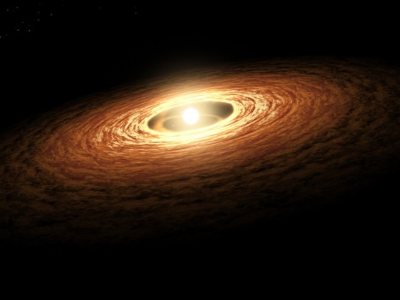 An artist’s impression of a young star surrounded by a rotating disk of gas and dust.