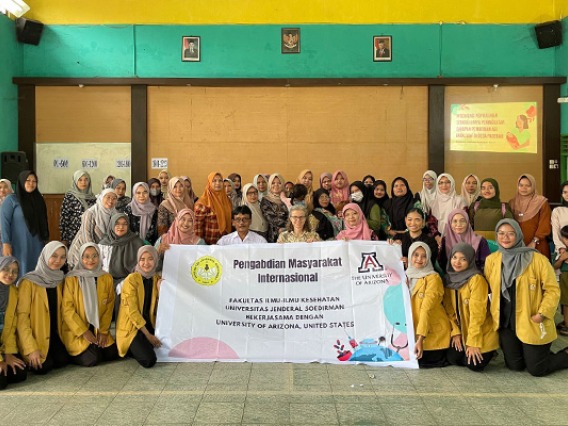 The photo shows participants, pregnant women, village head Sutono, SE, lecturers Siwi Pramatama, Leni Maryati, Dr. Arih Diyaning Intiasari, and Public Health students.