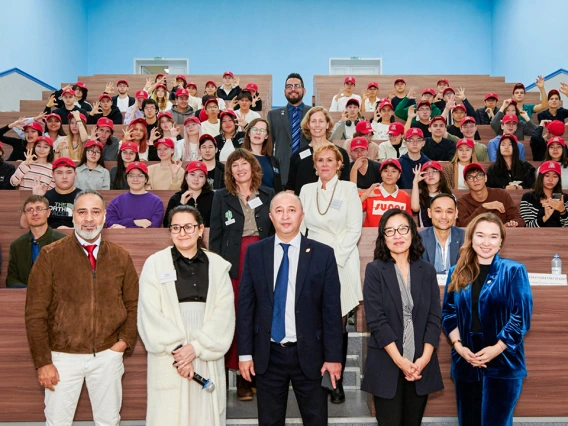 U of A and Kozybayev leadership poses with incoming student class.