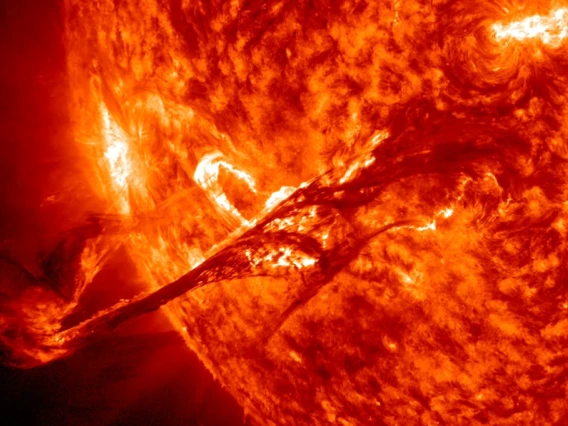 A solar flare erupts from the sun's surface