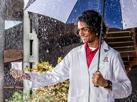 Scientist standing in the rain