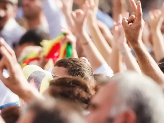 Crowd with hands raised