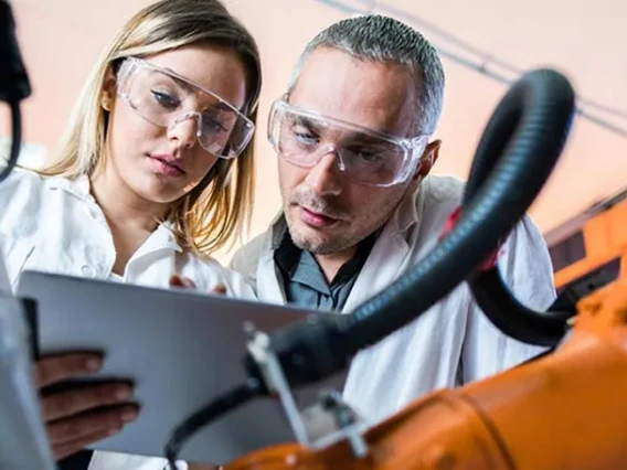 Engineers viewing a tablet device
