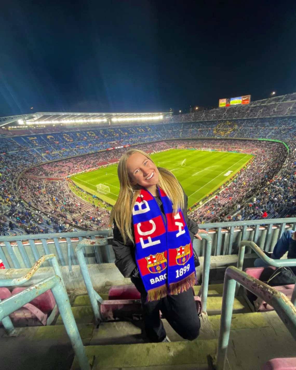 Kylie at the top of a football stadium in Barcelona, Spain