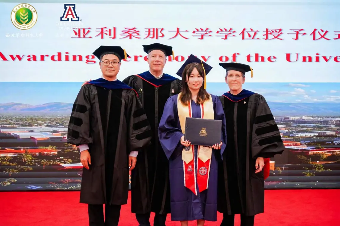 University of Arizona Associate Vice President for China & East Asia Affairs Charles Wang; UArizona Microcampus Director, NWAFU Ken Smith; CALES Outstanding Senior for Microcampus Programs Liu Siyu, and Department of Environmental Science interim head Joan Curry at UArizona-NWAFU Microcampus graduation June 17, 2024 in Yangling, China.