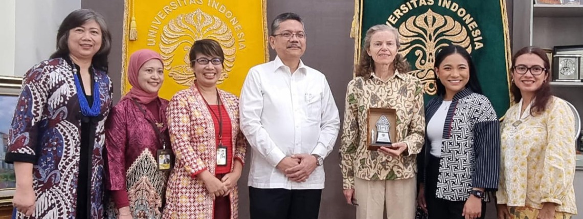 Mel and Enid Zuckerman College of Public Health representatives stand with partners from universities in Indonsia.