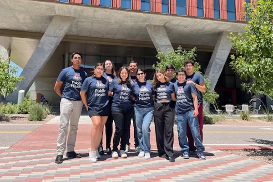 Students from the Universidad del Valle de México stand together outside