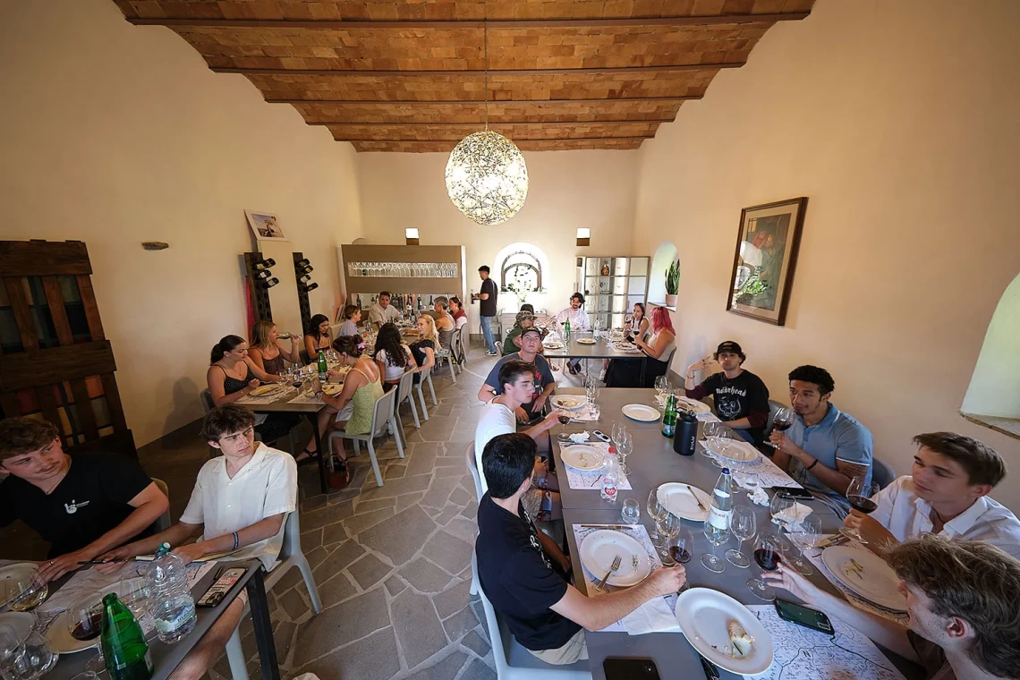 University of Arizona summer study abroad students enjoy a meal together in the Italian countryside. Photo by Michael McKisson.