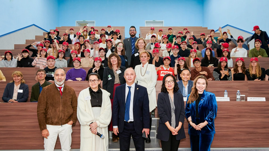 U of A and Kozybayev leadership poses with incoming student class.