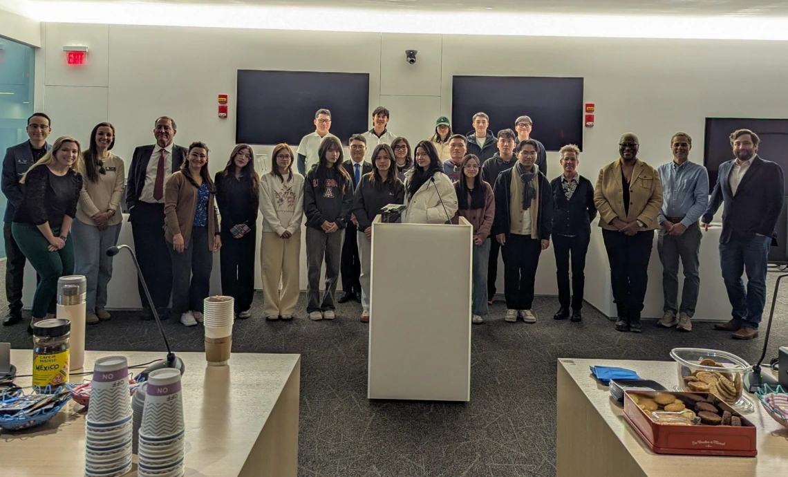 A large group of Study Arizona students smile at the camera.