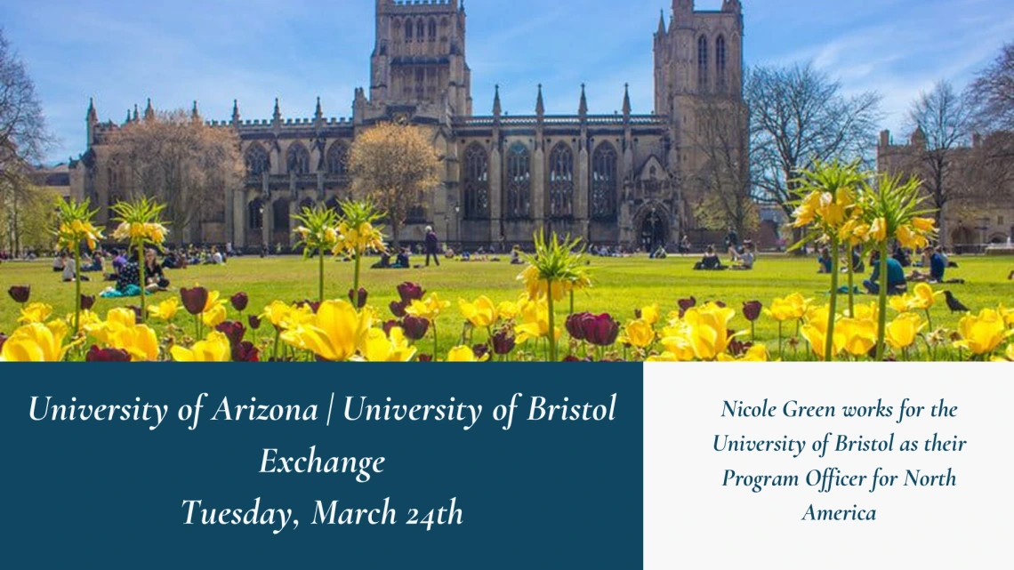 University of Bristol campus with flowers in the foreground and a castle looking building in the background