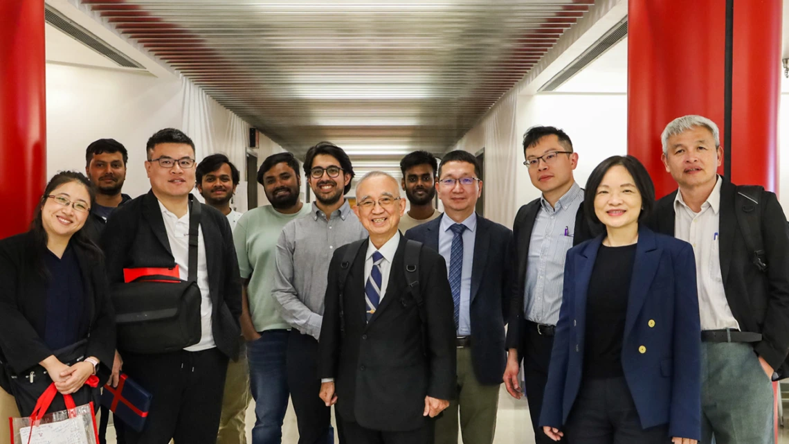 Delegates from the Academy of Innovative Semiconductor and Sustainable Manufacturing (AISSM) at National Cheng Kung University (NCKU) stand with U of A students and faculty.