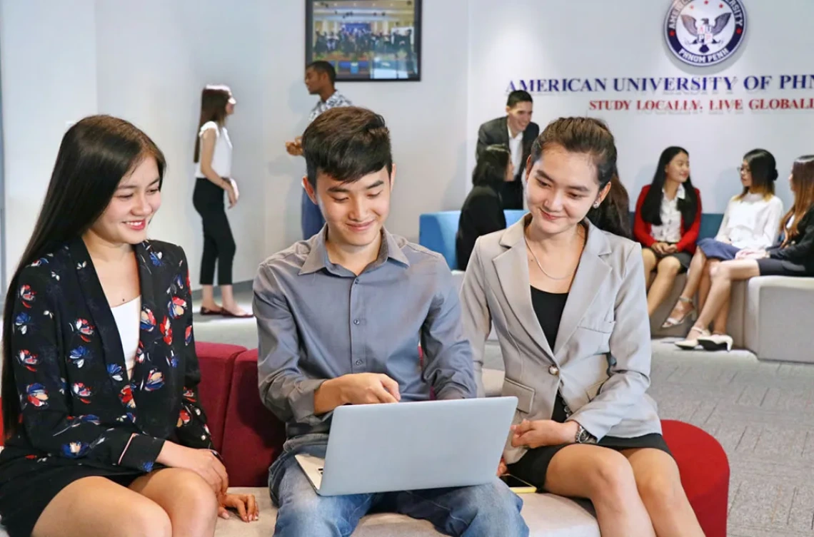 Students with a laptop