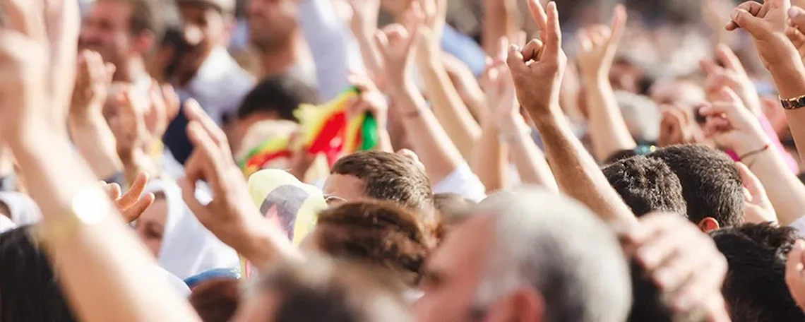 Crowd with hands raised