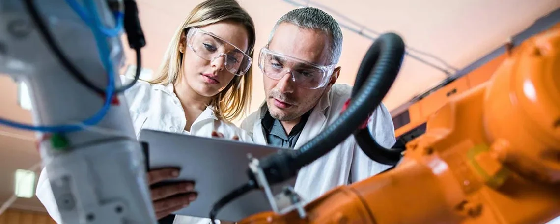 Engineers viewing a tablet device