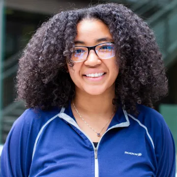 UArizona Gilman alumni intern Valentina Ayala-Dean smiles at the camera