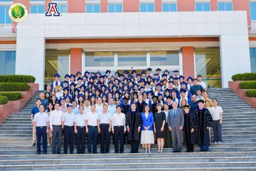 A large group photo of the dual degree graduates from Northwest Agriculture and Forestry University