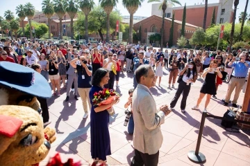 Wilma and Wilbur Wildcat, The Pride of Arizona marching band and several members of the campus community attended the welcome event for President Garimella.