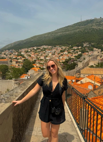 Kylie stands on a walkway in Dubrovnik, Croatia