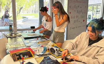 Potential study abroad students work on their vision boards.