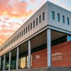 University of Arizona Eller College of Management building at dusk.