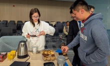 Students grab food at the event.