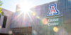 Sun sets behind the University of Arizona Global Center building