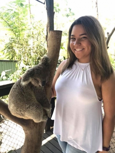 Study Abroad alum Dominique with a Koala