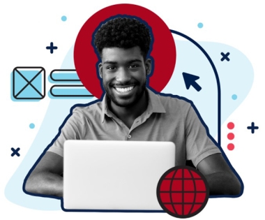 Male college student smiling and working on a laptop 