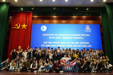 UArizona Hanoi Law University dual degree students gather on stage for photo