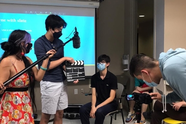 Dennis Zhuang in film class with fellow students