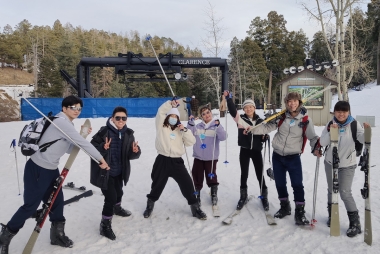Dennis Zhuang skiing with friends on Mt. Lemmon in Tucson, AZ