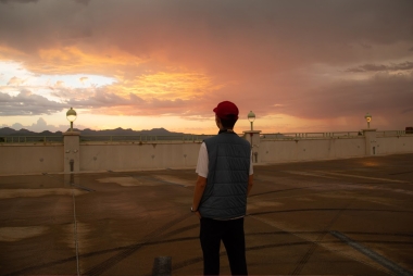 Dennis Zhuang watching a classic Arizona sunset