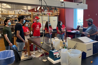 UVM students visiting a lab on the University of Arizona campus during their program visit