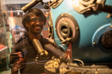 Nikhil Garuda looks at a telescope display at the Flandrau Planetarium on the UA campus in Tucson, AZ